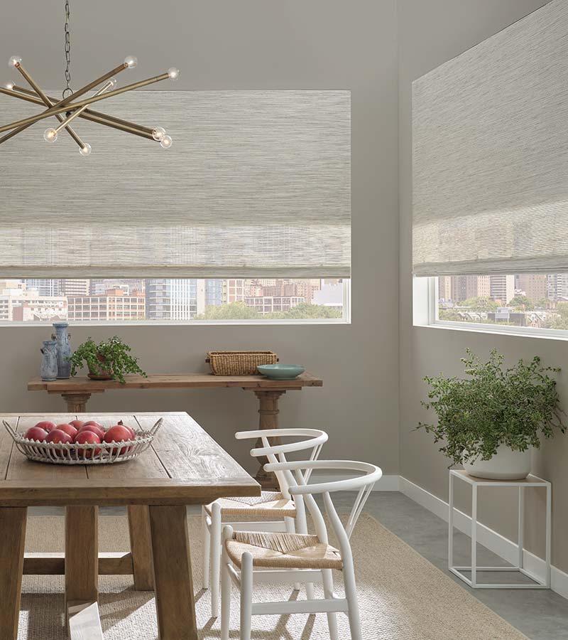 automated woven shades in dining room