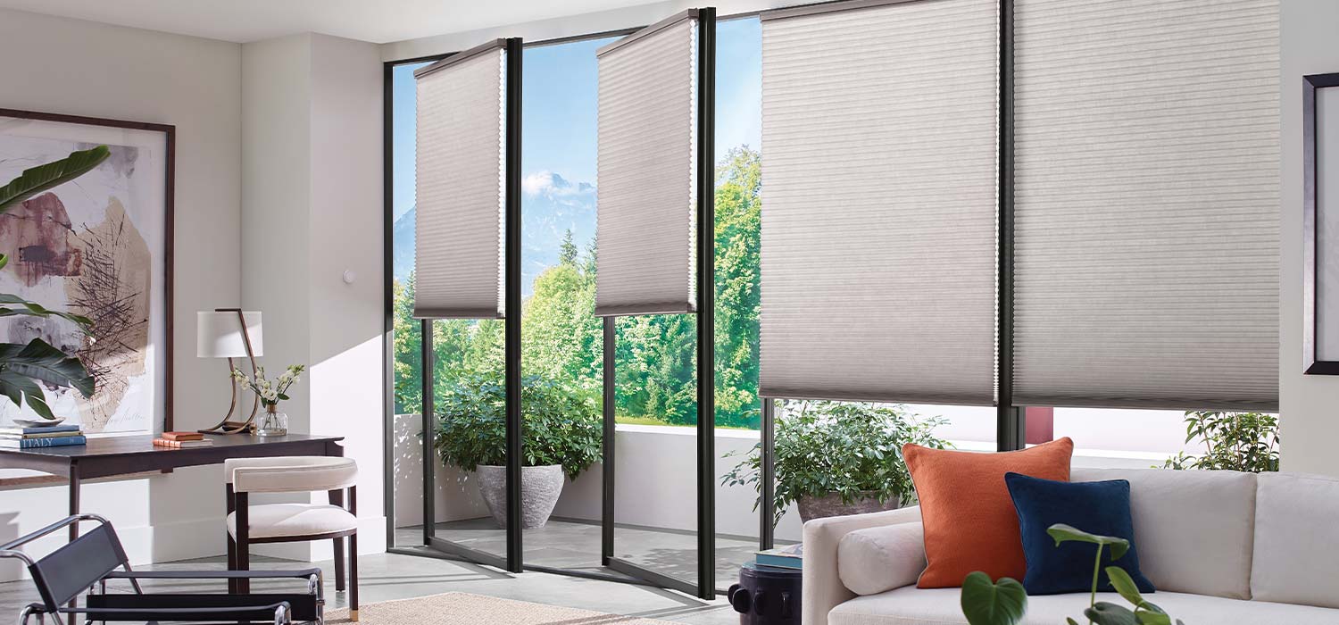 trackglide-with-honeycomb-shades-banner-timan-window-treatments honeycomb cellular shades on patio glass doors timan and co.